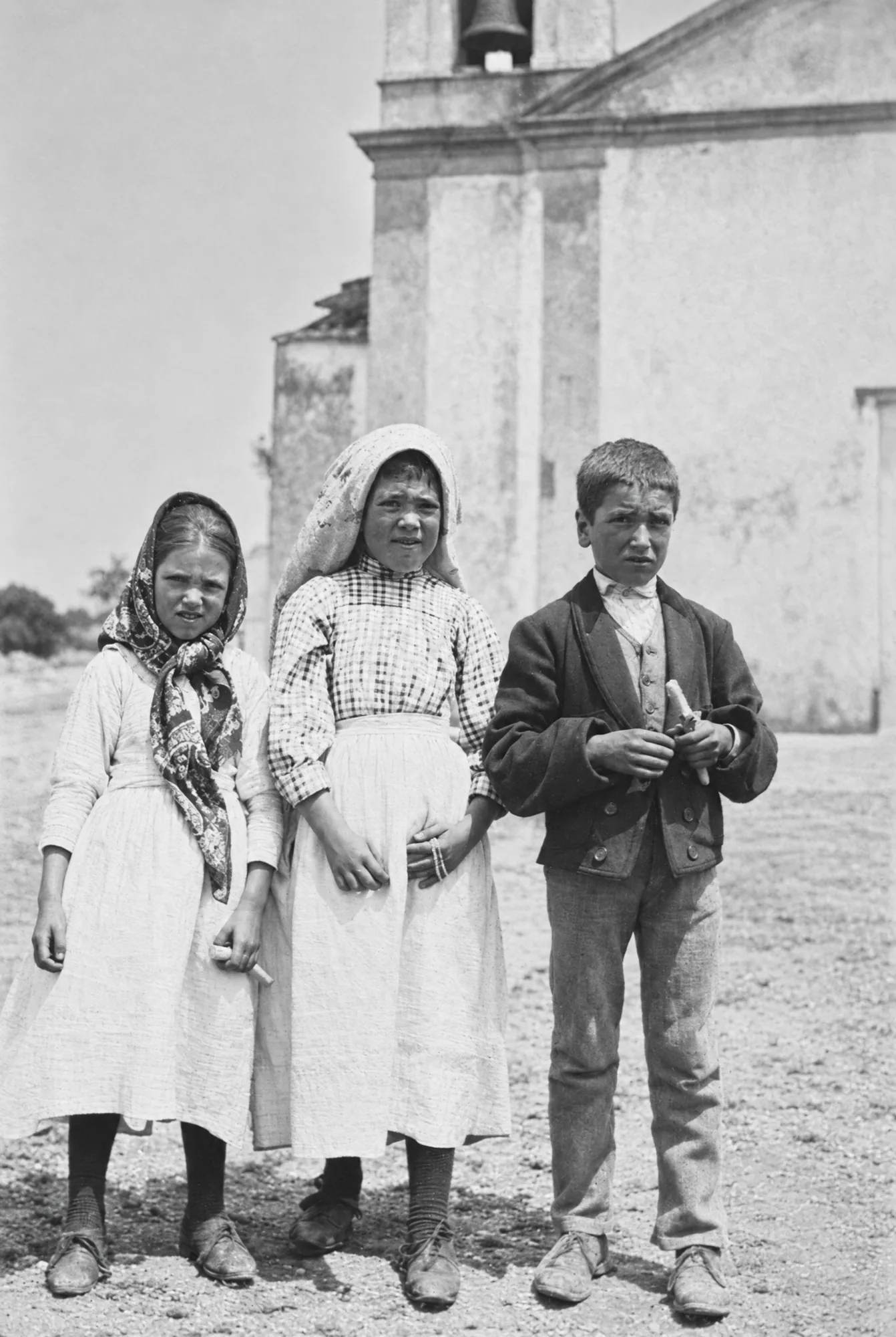 The three seers by the parish church of Fátima, July 1917: Restored (AI)