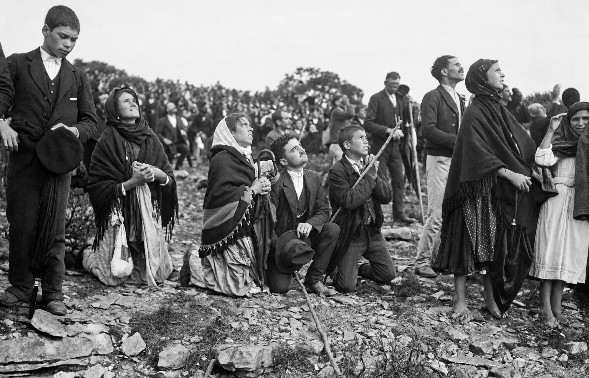 Crowd kneeling and praying during the solar phenomenon, 13 October 1917: Restored (AI)