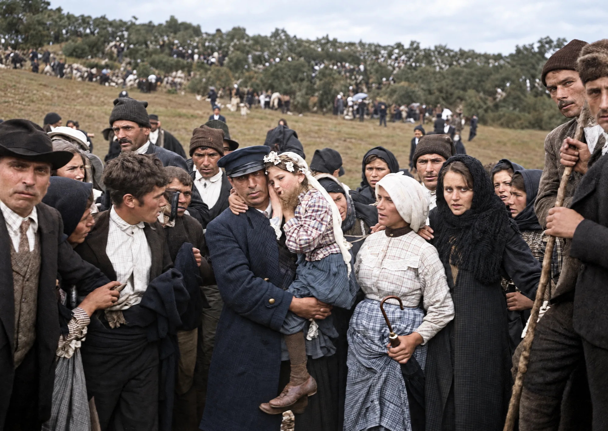 Jacinta, crying, is carried in a man's arms, 13 October 1917: Colour (AI)